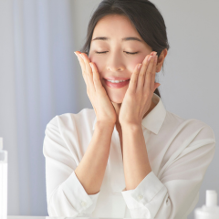 Applying moisturizer for healthy skin